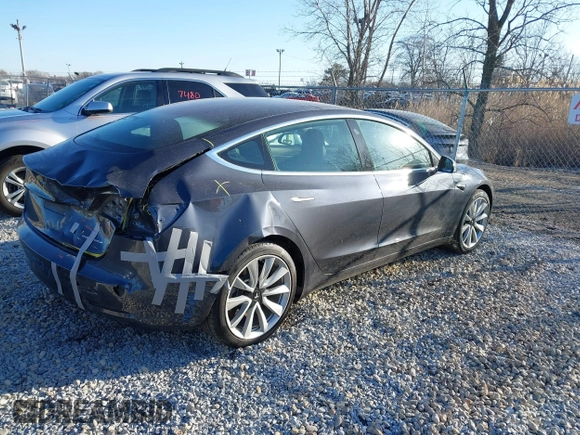 2020 Tesla Model 3 Long Range with VIN 5YJ3E1EB9LF795408, listed as a IAAI auction lot 41735428 with 56,013 mi miles. Bid and sale history available at carsss.com. Image 4.