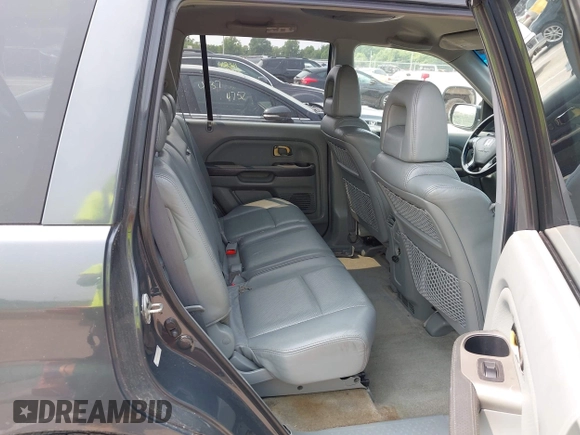 2003 Honda Pilot EX z VIN 2HKYF18573H616406, wystawiony jako IAAI lot #42363152 z przebiegiem 323 672 mil mil oraz . Historia ofert i sprzedaży dostępna na DreamBid. Obrazek 8.