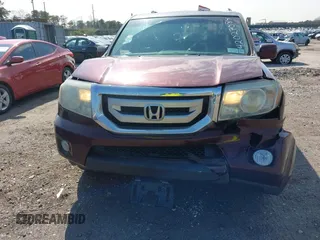 2011 Honda Pilot EX-L with VIN 5FNYF4H58BB060797, listed as a IAAI auction lot 42027084 with 175,466 mi miles. Bid and sale history available at carsss.com. Image 12.