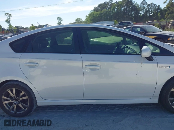 2013 Toyota Prius One z VIN JTDKN3DU6D0343264, wystawiony jako IAAI lot #42170569 z przebiegiem 124 533 mil mil oraz . Historia ofert i sprzedaży dostępna na DreamBid. Obrazek 14.