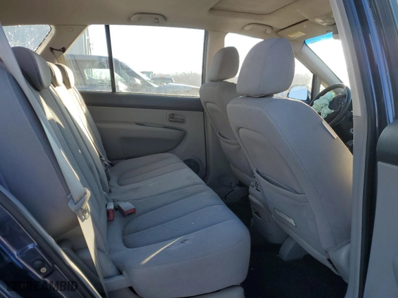 2007 Kia Rondo EX with VIN KNAFG526377120667, listed as a Copart auction lot 82762994 with 224,991 mi miles and Salvage Title. Bid and sale history available at carsss.com. Image 12.