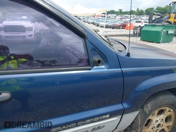 2000 Jeep Grand Cherokee Laredo z VIN 1J4GW48S9YC338947, wystawiony jako IAAI lot #42545830 z przebiegiem 234 251 mil mil oraz . Historia ofert i sprzedaży dostępna na DreamBid. Obrazek 6.