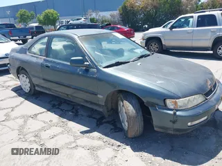 1996 Honda Accord LX with VIN 1HGCD7233TA023922, listed as a IAAI auction lot 42203135 with 239,677 mi miles and . Bid and sale history available at carsss.com. Image 1.
