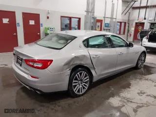 2015 Maserati Quattroporte S Q4 with VIN ZAM56RRA9F1131009, listed as a IAAI auction lot 41632708 with 83,020 mi miles. Bid and sale history available at carsss.com. Image 4.