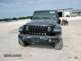 2023 Jeep Wrangler Willys with VIN 1C4HJXDGXPW526093, listed as a Copart auction lot 56818935 with 24,021 mi miles and Salvage title. Bid and sale history available at DreamBid. Image 13.