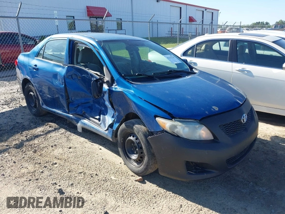 2009 Toyota Corolla with VIN 2T1BU40E69C166333, listed as a IAAI auction lot 42137539 with 127,564 mi miles. Bid and sale history available at carsss.com. Image 1.