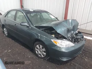 2004 Toyota Camry LE with VIN 4T1BE30K54U377818, listed as a IAAI auction lot 41931027 with 212,690 mi miles. Bid and sale history available at carsss.com. Image 1.
