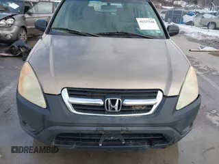 2004 Honda CR-V LX with VIN JHLRD78454C024250, listed as a IAAI auction lot 41227320 with 317,109 mi miles and . Bid and sale history available at carsss.com. Image 10.