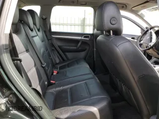 2005 Porsche Cayenne z VIN WP1AA29P65LA24059, wystawiony jako Copart lot #57484235 z przebiegiem Nie podano mil oraz Szkoda całkowita • Salvage title. Historia ofert i sprzedaży dostępna na DreamBid. Obrazek 11.