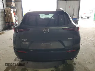 2023 Mazda CX-30 S Carbon Edition z VIN 3MVDMBCM5PM569903, wystawiony jako Copart lot #84850594 z przebiegiem 14 653 mil mil oraz Szkoda całkowita • Salvage title. Historia ofert i sprzedaży dostępna na DreamBid. Obrazek 6.
