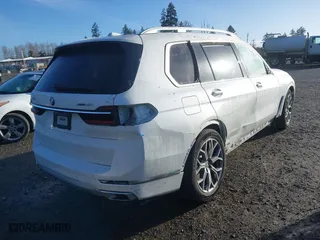 2023 BMW X7 xDrive40i with VIN 5UX23EM08P9N90606, listed as a IAAI auction lot 41692128 with 34,752 mi miles. Bid and sale history available at carsss.com. Image 4.