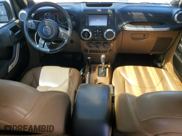 2013 Jeep Wrangler Unlimited Rubicon with VIN 1C4BJWFG0DL587057, listed as a Copart auction lot 57362535 with 102,684 mi miles and Salvage title. Bid and sale history available at DreamBid. Image 8.