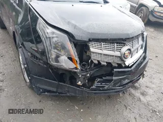 2011 Cadillac SRX Luxury Collection z VIN 3GYFNAEY0BS629344, wystawiony jako IAAI lot #42208369 z przebiegiem 198 330 mil mil oraz . Historia ofert i sprzedaży dostępna na DreamBid. Obrazek 6.