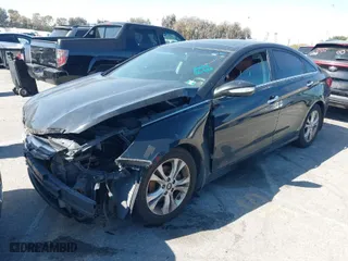 2012 Hyundai Sonata 2.4L Limited PZEV with VIN 5NPEC4AC4CH456183, listed as a IAAI auction lot 42014706 with 128,484 mi miles. Bid and sale history available at carsss.com. Image 2.