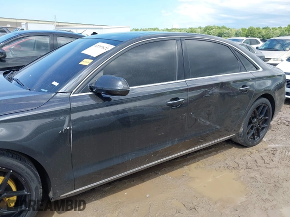 2011 Audi A8 с VIN WAURVAFDXBN020316, выставлен на аукционе IAAI как лот 42297622 с пробегом 156 881 миль миль и . История ставок и продаж доступна на DreamBid. Изображение 14.