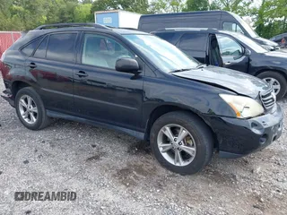2006 Lexus RX 400h with VIN JTJGW31U560001666, listed as a IAAI auction lot 42257070 with 267,244 mi miles and . Bid and sale history available at DreamBid. Image 1.