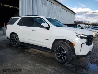 2022 Chevrolet Tahoe RST with VIN 1GNSKRKL0NR294654, listed as a Copart auction lot 82858864 with 74,410 mi miles and Salvage Title. Bid and sale history available at carsss.com. Image 4.