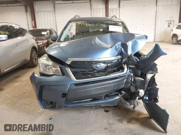 2018 Subaru Forester Premium with VIN JF2SJGECXJH606668, listed as a IAAI auction lot 41879710 with 64,910 mi miles. Bid and sale history available at carsss.com. Image 12.