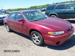 2003 Pontiac Grand Prix SE z VIN 1G2WK52J93F178003, wystawiony jako IAAI lot #42308184 z przebiegiem 124 714 mil mil oraz . Historia ofert i sprzedaży dostępna na DreamBid. Obrazek 1.