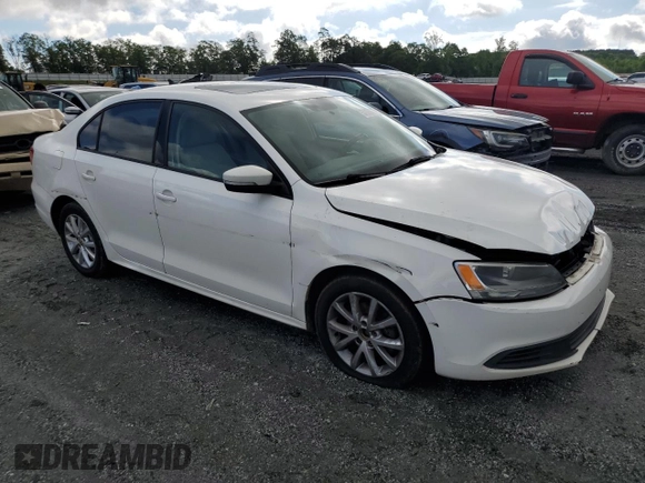 2012 Volkswagen Jetta SE with VIN 3VWDP7AJ4CM335256, listed as a Copart auction lot 57080145 with 228,239 mi miles and Salvage title. Bid and sale history available at DreamBid. Image 4.