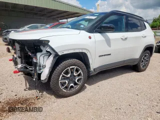 2025 Jeep Compass Trailhawk с VIN 3C4NJDDN5ST557508, выставлен на аукционе Copart как лот 64299955 с пробегом 13 539 миль миль и Чистый • Clean title. История ставок и продаж доступна на DreamBid. Изображение 1.