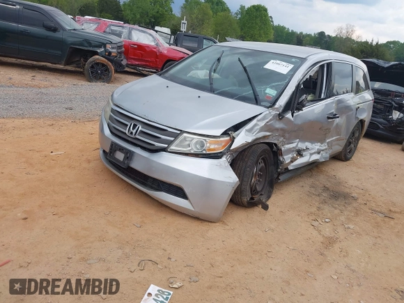 2013 Honda Odyssey LX with VIN 5FNRL5H27DB075559, listed as a IAAI auction lot 42007141 with Not Provided miles and . Bid and sale history available at carsss.com. Image 16.