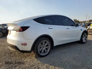 2023 Tesla Model Y Long Range with VIN 7SAYGDEE9PA129876, listed as a Copart auction lot 41819605 with 36,110 mi miles and Salvage Title. Bid and sale history available at DreamBid. Image 3.