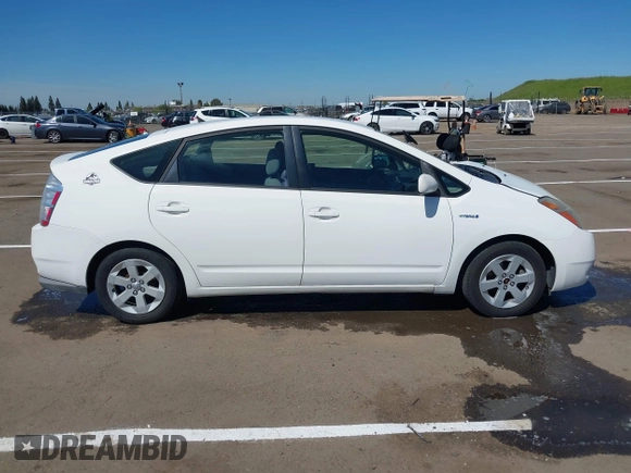 2007 Toyota Prius with VIN JTDKB20U977586376, listed as a IAAI auction lot 41848417 with 131,648 mi miles and . Bid and sale history available at DreamBid. Image 13.