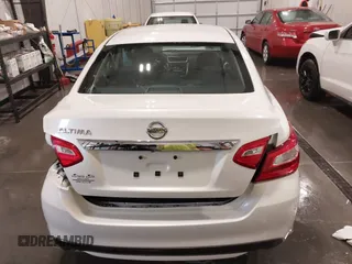 2016 Nissan Altima SV with VIN 1N4AL3AP5GC215428, listed as a IAAI auction lot 41712804 with 94,526 mi miles and . Bid and sale history available at DreamBid. Image 17.