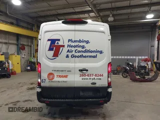 2021 Ford Transit Cargo with VIN 1FTBR1C82MKA29712, listed as a IAAI auction lot 41463781 with 83,961 mi miles and . Bid and sale history available at DreamBid. Image 17.