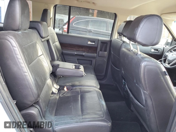 2014 Ford Flex Limited z VIN 2FMGK5D89EBD10509, wystawiony jako Copart lot #57614265 z przebiegiem 174 650 mil mil oraz Szkoda całkowita • Salvage title. Historia ofert i sprzedaży dostępna na DreamBid. Obrazek 11.