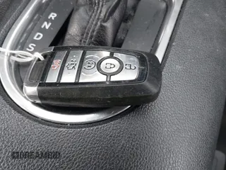 2022 Ford Mustang EcoBoost z VIN 1FA6P8TH4N5105288, wystawiony jako IAAI lot #41528117 z przebiegiem 44 424 mil mil oraz . Historia ofert i sprzedaży dostępna na DreamBid. Obrazek 11.