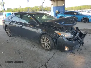 2015 Toyota Avalon Limited with VIN 4T1BK1EB8FU149076, listed as a Copart auction lot 53856665 with 137,179 mi miles and Salvage Title. Bid and sale history available at DreamBid. Image 4.