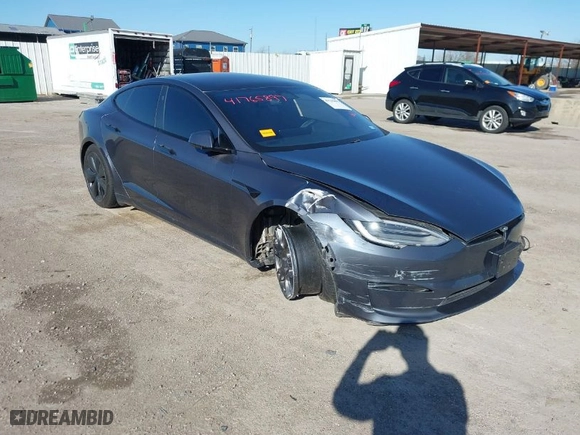 2022 Tesla Model S with VIN 5YJSA1E57NF467229, listed as a IAAI auction lot 41765897 with 1 mi miles. Bid and sale history available at carsss.com. Image 1.