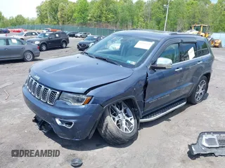 2021 Jeep Grand Cherokee 80th Anniversary with VIN 1C4RJFBGXMC775539, listed as a IAAI auction lot 42241659 with 23,541 mi miles and . Bid and sale history available at DreamBid. Image 2.