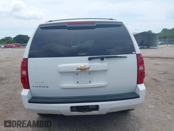 2007 Chevrolet Tahoe LTZ with VIN 1GNFC13J47J336516, listed as a IAAI auction lot 42545424 with 211,669 mi miles and . Bid and sale history available at DreamBid. Image 16.