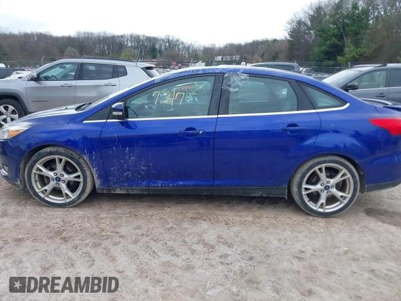 2015 Ford Focus Titanium with VIN 1FADP3J27FL298882, listed as a IAAI auction lot 42117247 with 124,185 mi miles and . Bid and sale history available at carsss.com. Image 14.