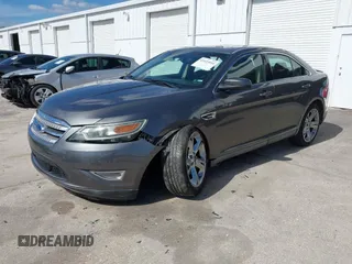 2011 Ford Taurus SHO with VIN 1FAHP2KT6BG167447, listed as a IAAI auction lot 41433934 with 201,600 mi miles and . Bid and sale history available at DreamBid. Image 2.