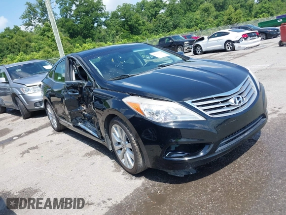 2013 Hyundai Azera z VIN KMHFH4JG0DA310957, wystawiony jako IAAI lot #42451780 z przebiegiem 82 827 mil mil oraz . Historia ofert i sprzedaży dostępna na DreamBid. Obrazek 1.