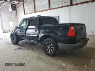 2005 Ford Explorer Sport Trac XLS with VIN 1FMDU77KX5UB63725, listed as a Copart auction lot 49386155 with 165,293 mi miles and Salvage title. Bid and sale history available at DreamBid. Image 2.