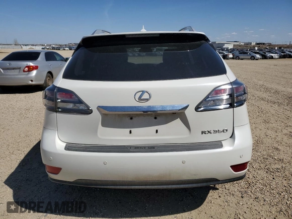 2012 Lexus RX 350 z VIN JTJBK1BAXC2441851, wystawiony jako Copart lot #54404125 z przebiegiem 231 907 mil mil oraz Szkoda całkowita • Salvage title. Historia ofert i sprzedaży dostępna na DreamBid. Obrazek 6.