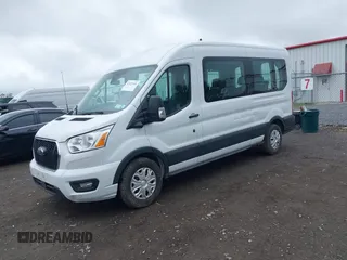 2022 Ford Transit Passenger XL with VIN 1FBAX2C86NKA79221, listed as a IAAI auction lot 42427641 with 56,245 mi miles and . Bid and sale history available at DreamBid. Image 2.