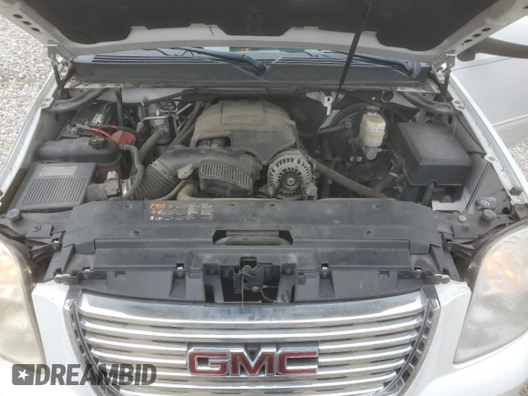 2012 GMC Yukon SLT with VIN 1GKS2CE09CR122728, listed as a Copart auction lot 87093604 with 124,739 mi miles and Salvage Title. Bid and sale history available at carsss.com. Image 14.