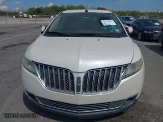 2011 Lincoln MKX with VIN 2LMDJ6JK4BBJ33136, listed as a IAAI auction lot 41824811 with 185,804 mi miles. Bid and sale history available at carsss.com. Image 6.