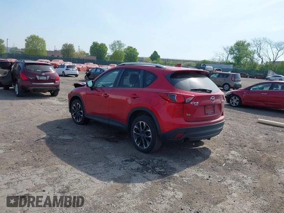 2016 Mazda CX-5 Grand Touring with VIN JM3KE4DY9G0850583, listed as a IAAI auction lot 42075545 with 92,789 mi miles and . Bid and sale history available at carsss.com. Image 3.