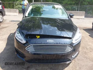 2018 Ford Focus Titanium z VIN 1FADP3J22JL220986, wystawiony jako IAAI lot #42410253 z przebiegiem 40 791 mil mil oraz . Historia ofert i sprzedaży dostępna na DreamBid. Obrazek 12.