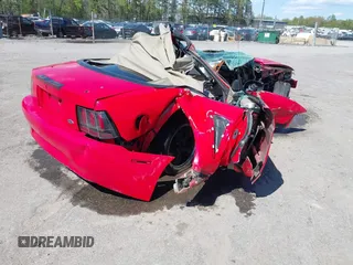 2003 Ford Mustang Deluxe z VIN 1FAFP44453F358762, wystawiony jako IAAI lot #42038789 z przebiegiem Nie podano mil oraz . Historia ofert i sprzedaży dostępna na DreamBid. Obrazek 4.