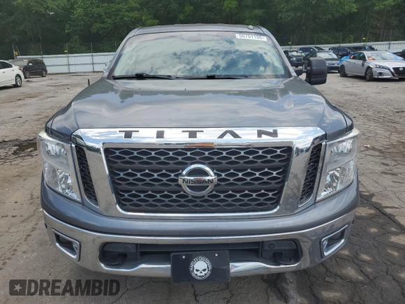 2017 Nissan Titan Platinum Reserve z VIN 1N6AA1E56HN571502, wystawiony jako Copart lot #56751155 z przebiegiem 105 017 mil mil oraz Szkoda całkowita • Salvage title. Historia ofert i sprzedaży dostępna na DreamBid. Obrazek 5.