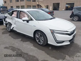 2018 Honda Clarity Touring z VIN JHMZC5F38JC015079, wystawiony jako IAAI lot #42044922 z przebiegiem 53 002 mil mil oraz . Historia ofert i sprzedaży dostępna na DreamBid. Obrazek 1.