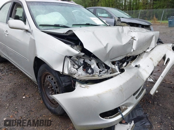 2003 Toyota Camry LE with VIN 4T1BE32K63U755835, listed as a IAAI auction lot 41976402 with 215,788 mi miles and . Bid and sale history available at DreamBid. Image 14.